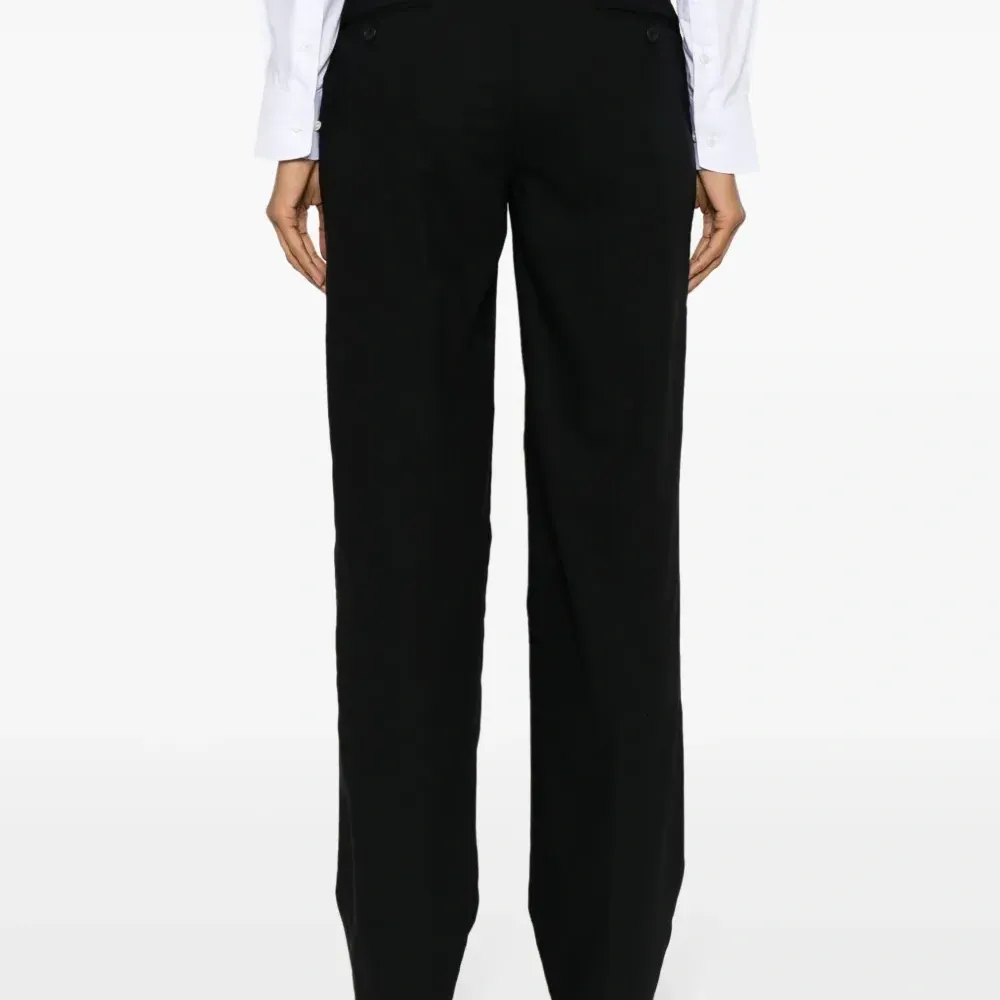 Шерстяные брюки строгого кроя