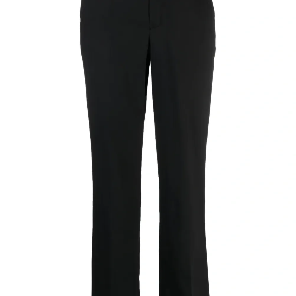 Шерстяные брюки строгого кроя