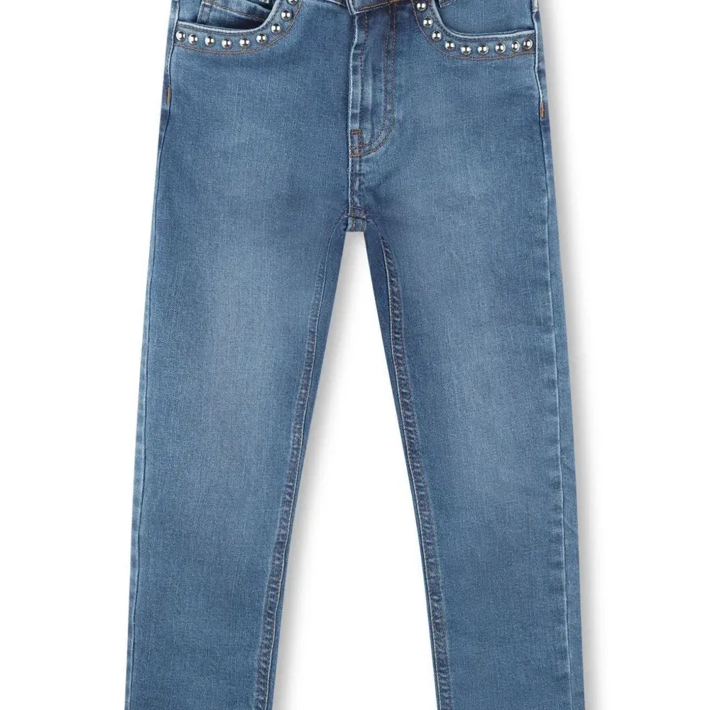 Джинсы с заклепками