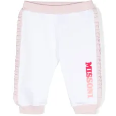 Спортивные брюки с оборками и логотипом