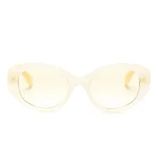 Солнцезащитные очки в овальной оправе с кристаллами