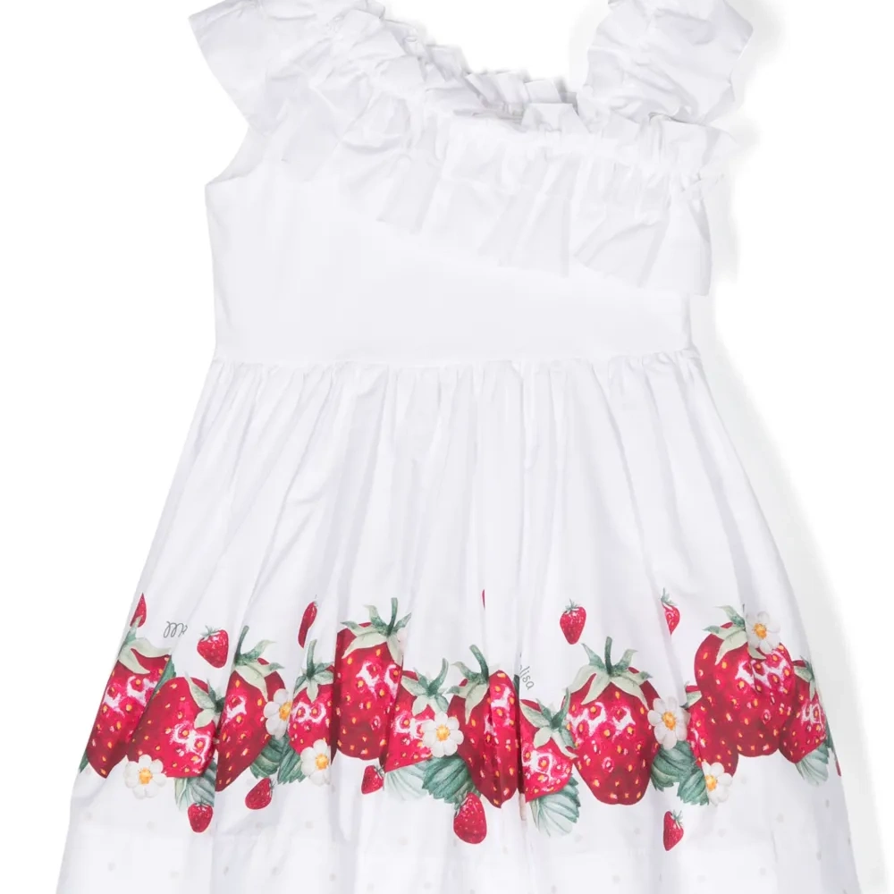 Платье асимметричного кроя с оборками и принтом