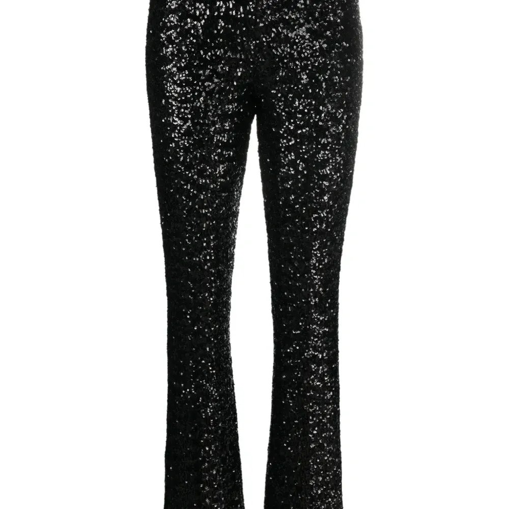 Широкие брюки с пайетками