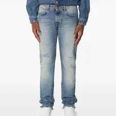 Джинсы с эффектом потертостей и необработанным краем Джинсы с эффектом потертостей и необработанным краем