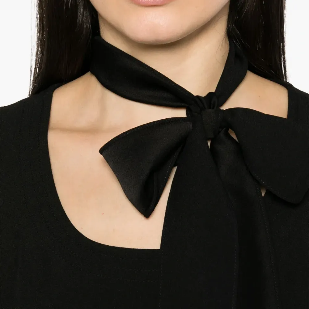 Блузка без рукавов с бантом