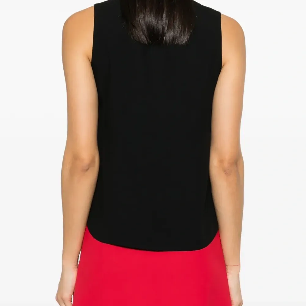 Блузка без рукавов с бантом