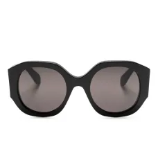 Массивные солнцезащитные очки в круглой оправе