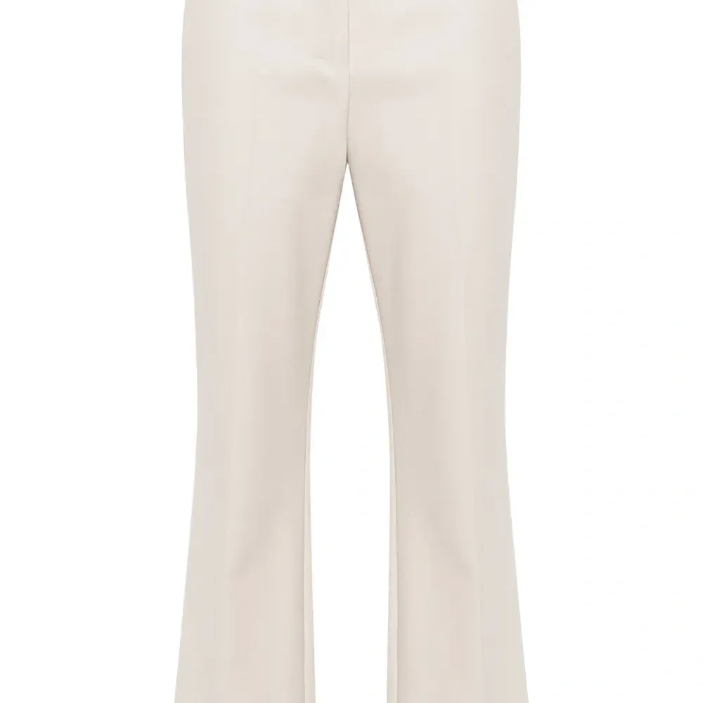 Расклешенные брюки со складками