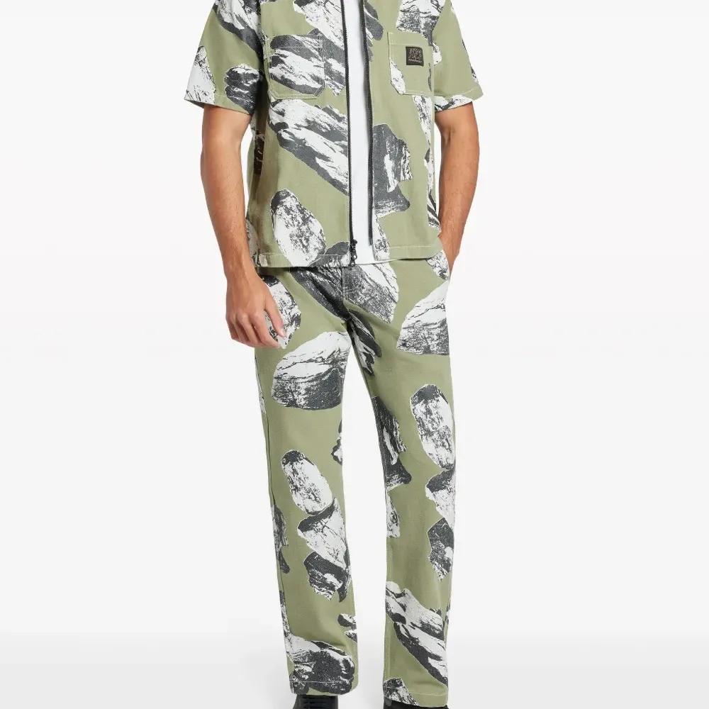 Брюки Talus с графичным принтом Брюки Talus с графичным принтом