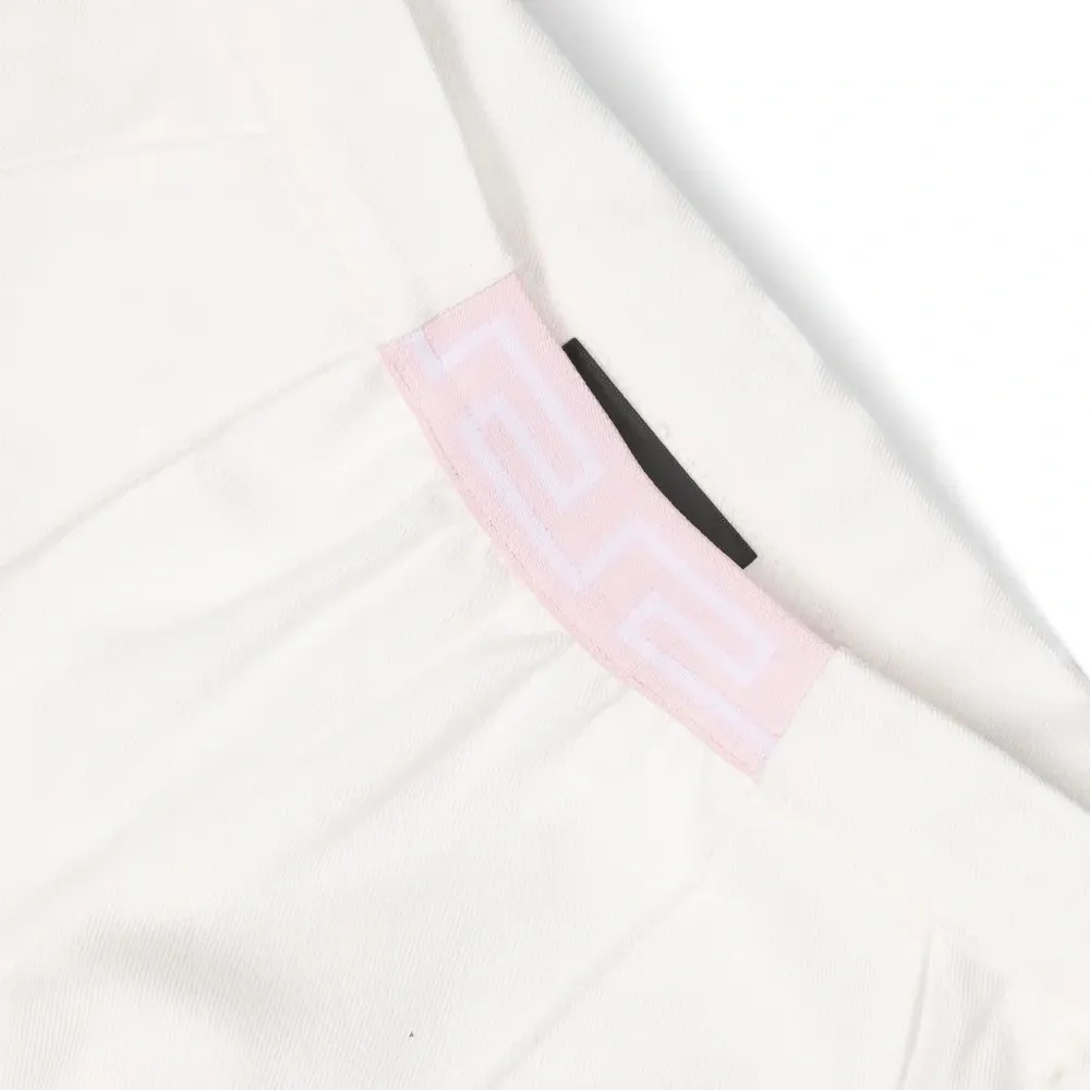 Зауженные брюки с узором Greca на поясе