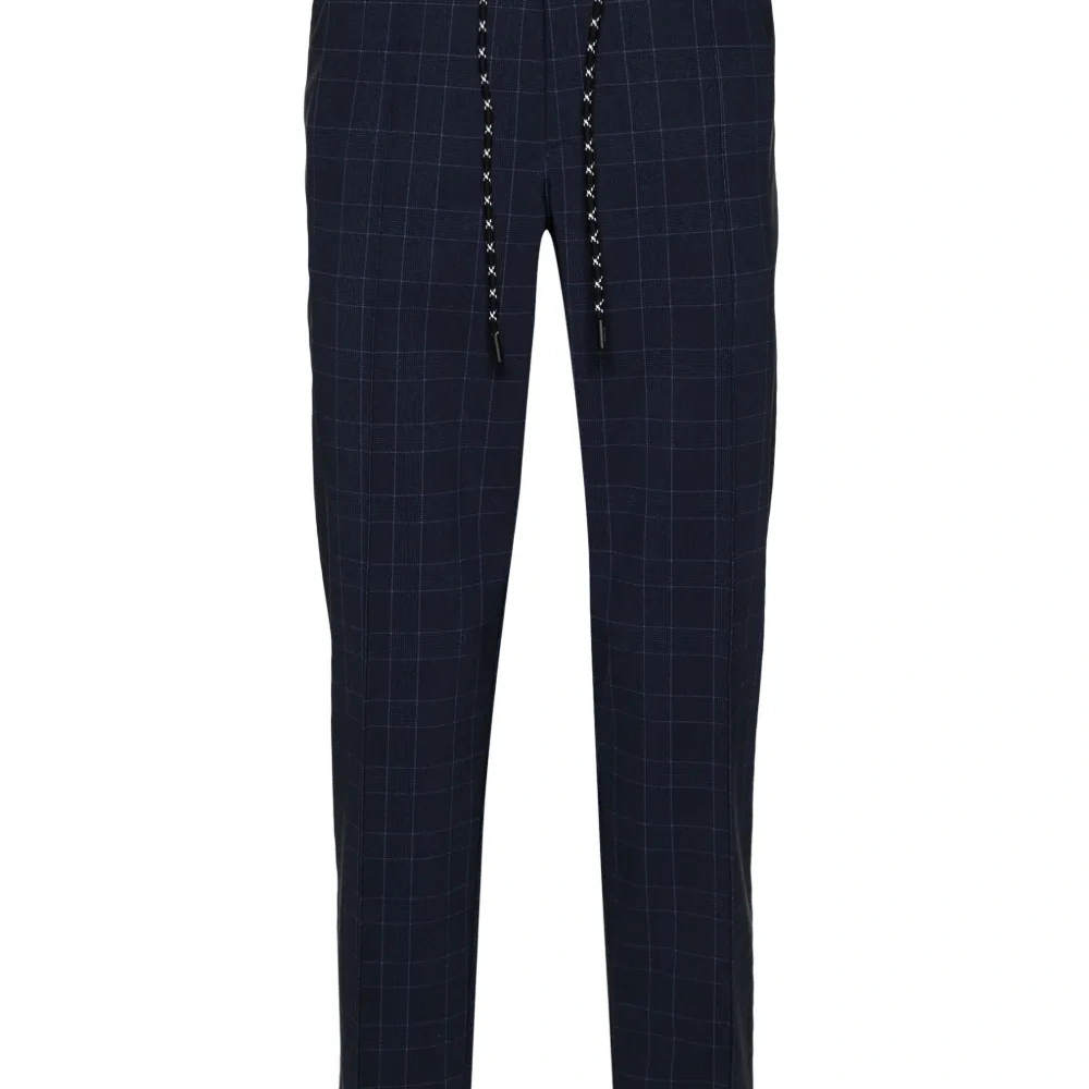 Зауженные брюки средней посадки