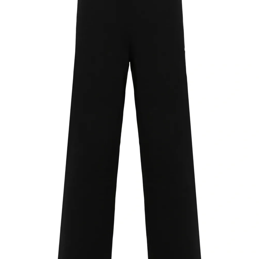 Спортивные брюки Solo Swoosh широкого кроя