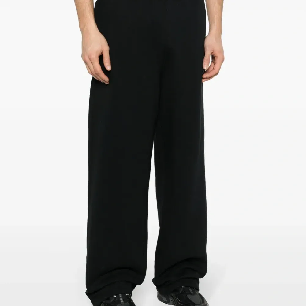 Спортивные брюки Solo Swoosh широкого кроя