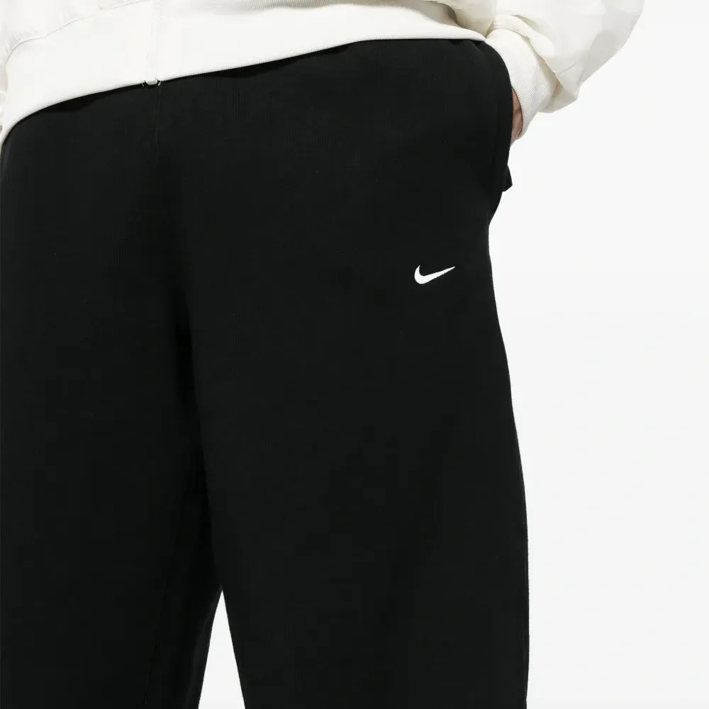 Спортивные брюки Solo Swoosh широкого кроя