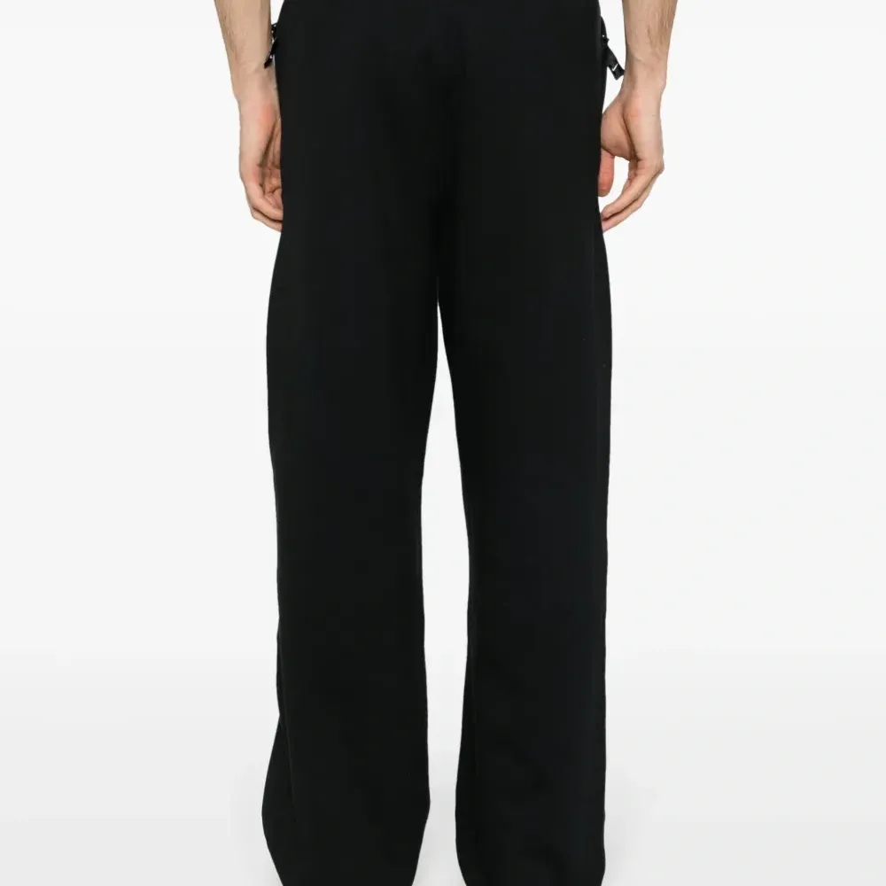 Спортивные брюки Solo Swoosh широкого кроя