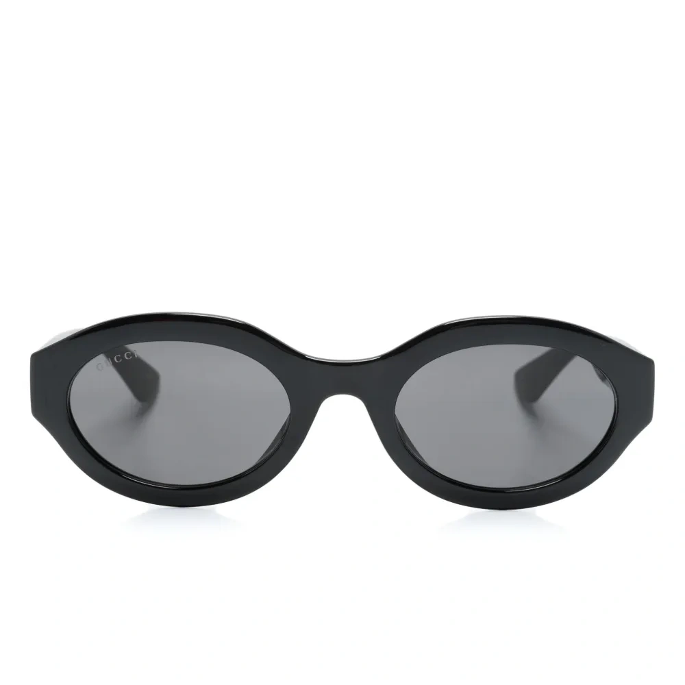 Солнцезащитные очки в овальной оправе