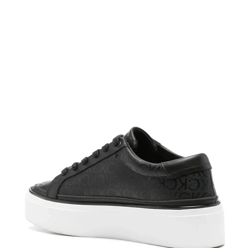 Кеды с монограммой на платформе