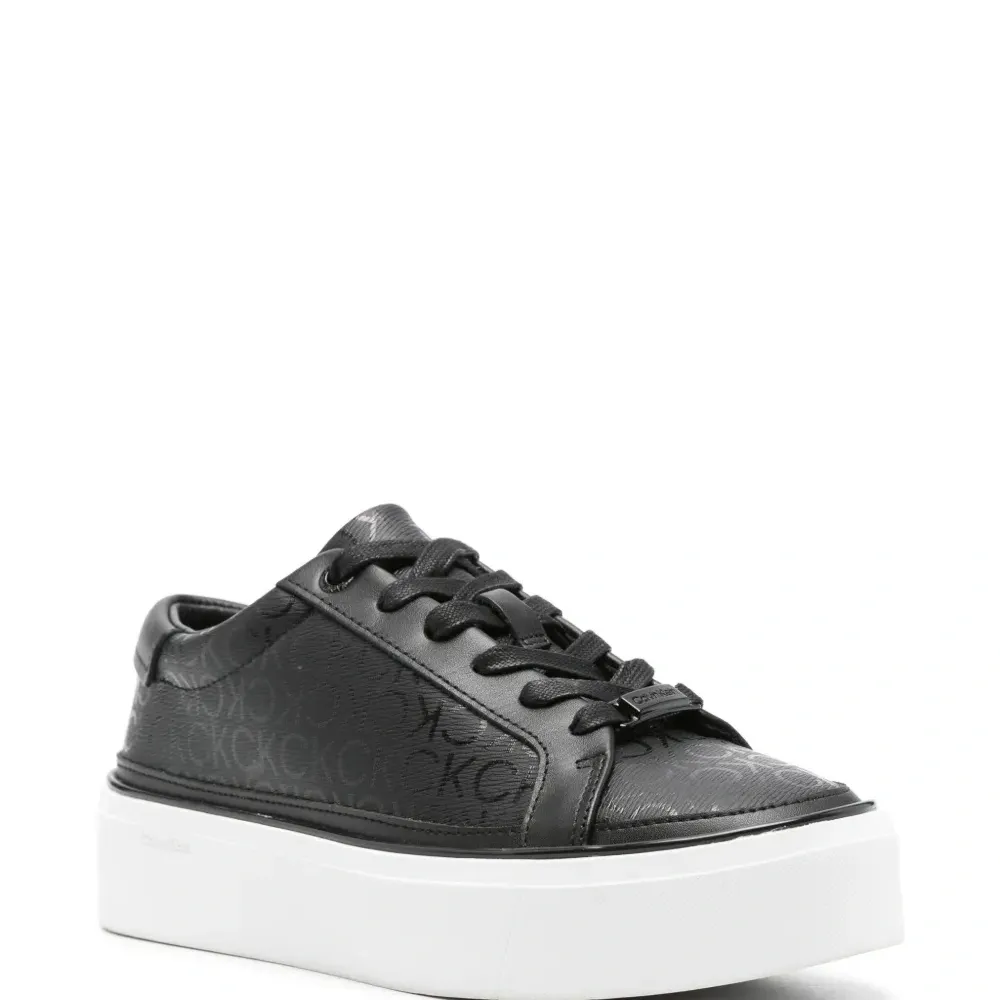 Кеды с монограммой на платформе