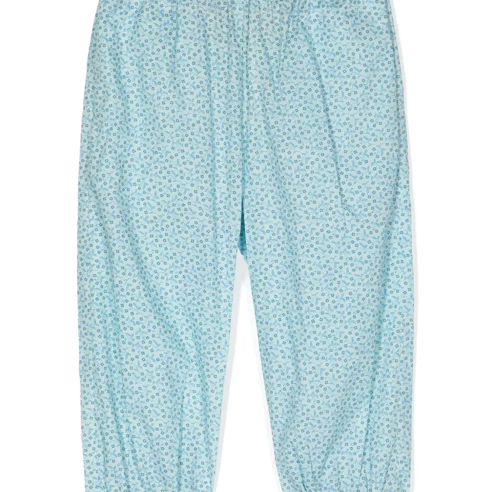 Брюки с цветочным принтом из коллаборации с KINDRED