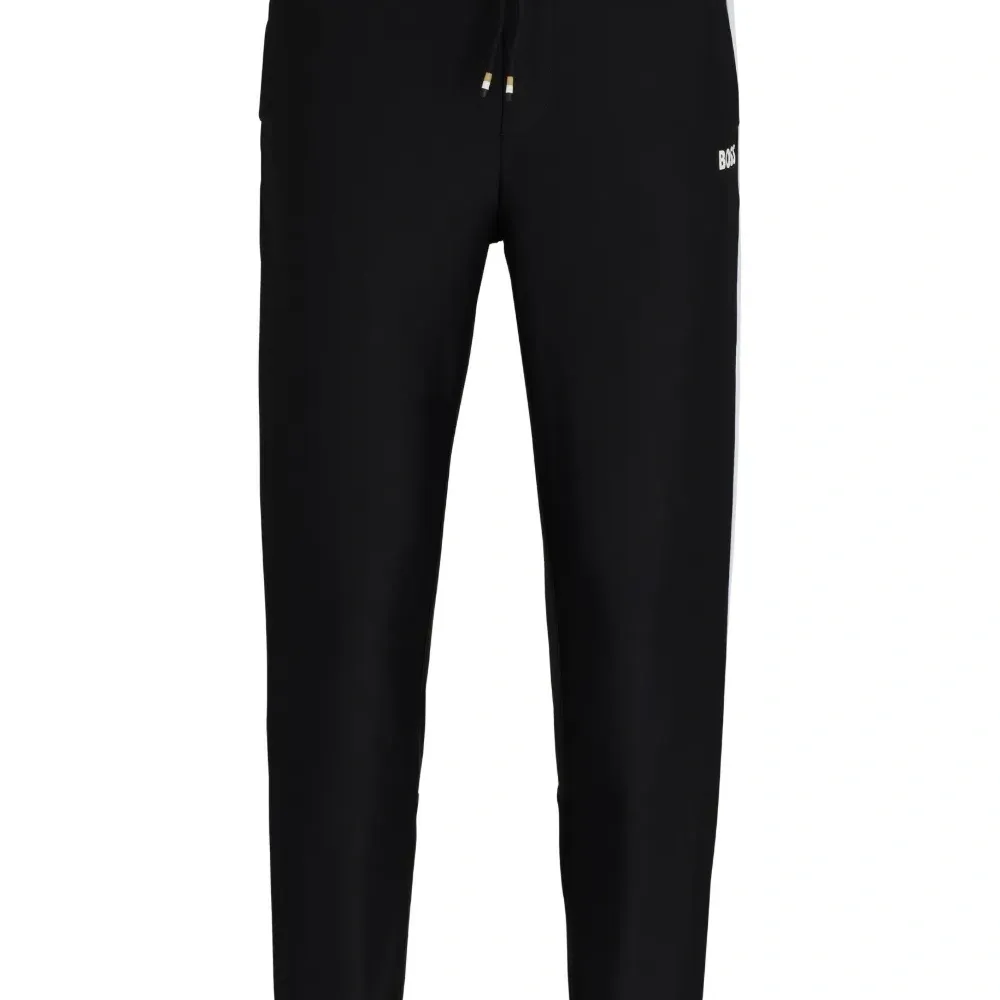 Джоггеры с лампасами из коллаборации с Matteo Berrettini