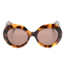 Солнцезащитные очки в круглой оправе