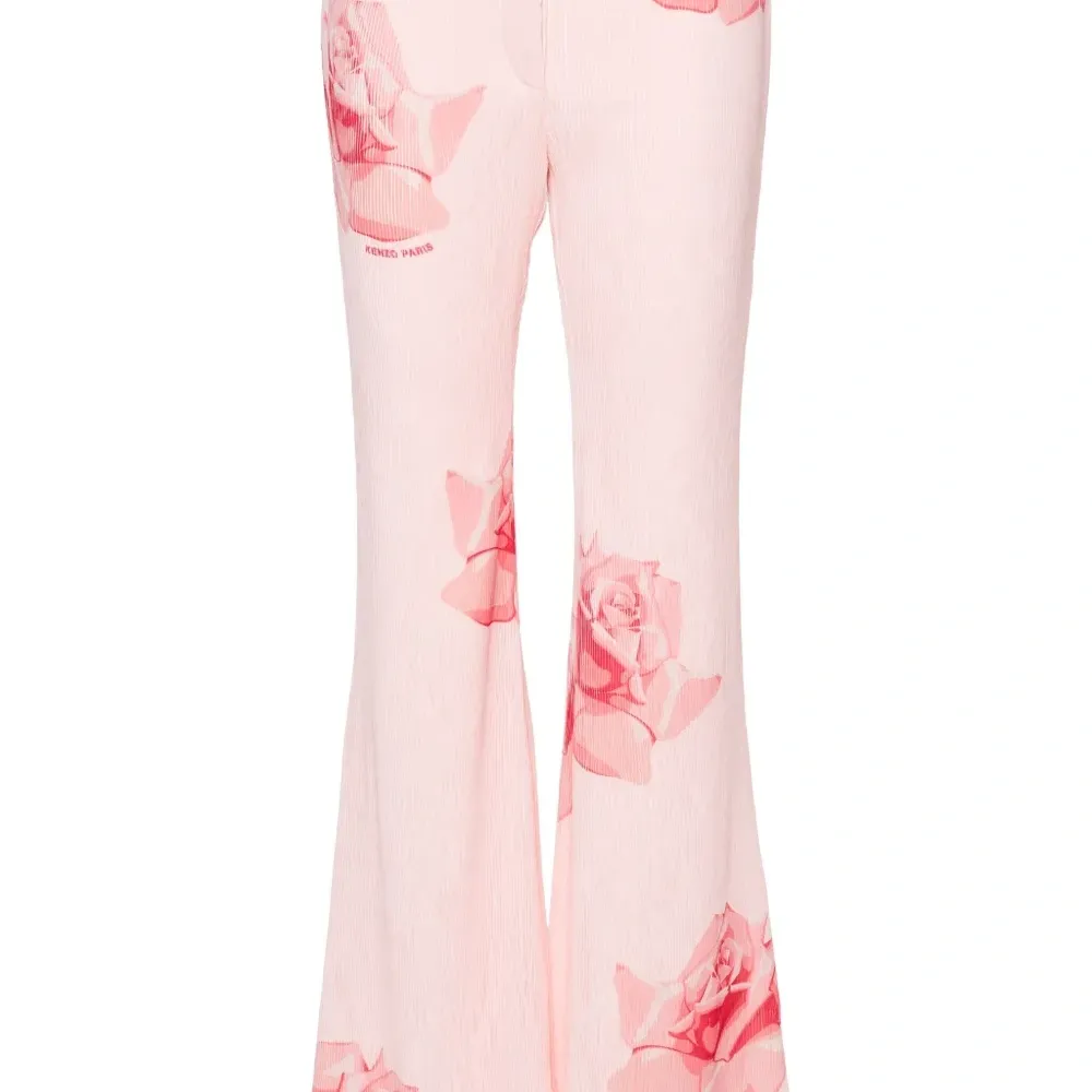 Расклешенные брюки с цветочным принтом