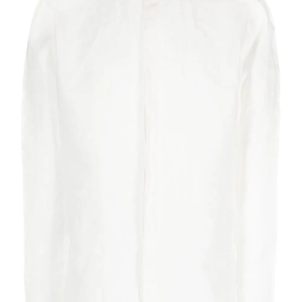 Льняная рубашка с бахромой