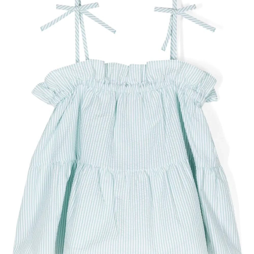 Блузка в полоску с оборками