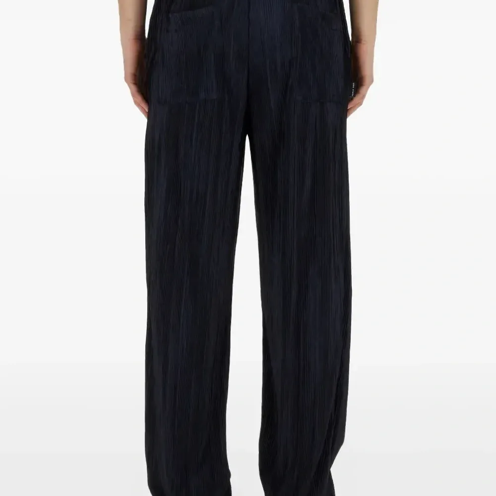 Плиссированные спортивные штаны