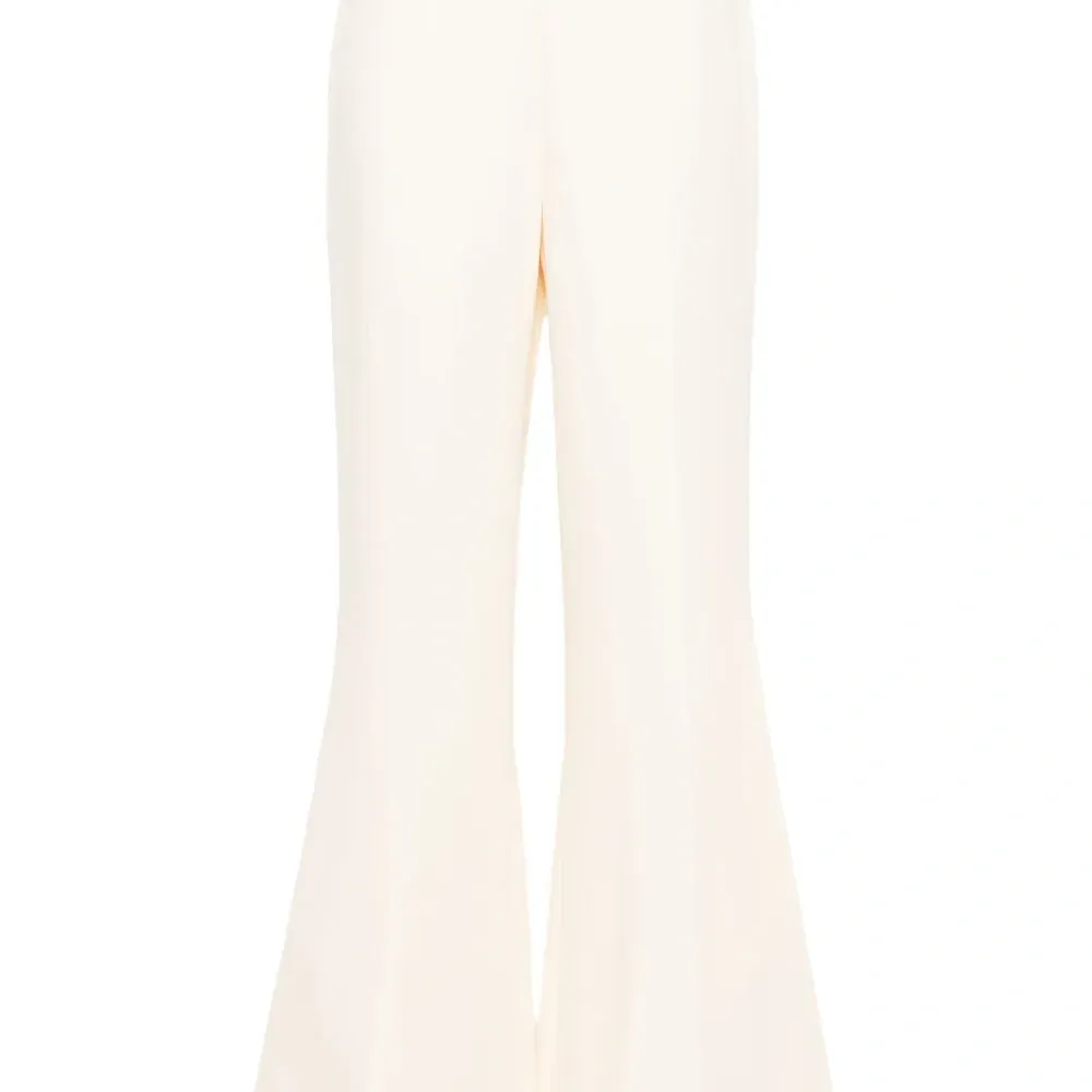 Расклешенные брюки со складками