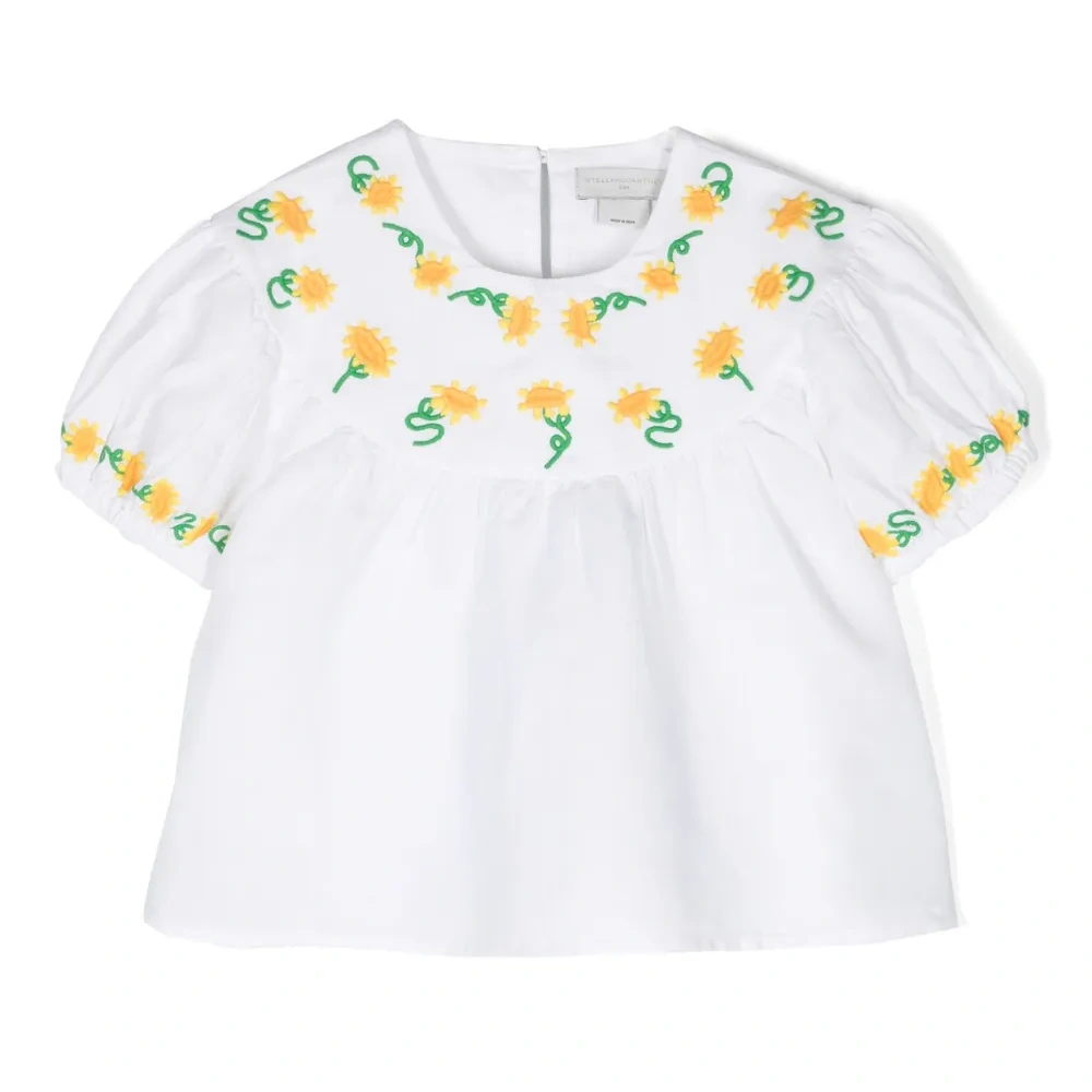 Блузка с вышивкой и сборками