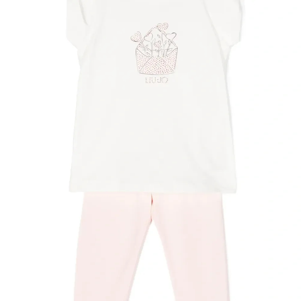 Комплект из топа и брюк со стразами