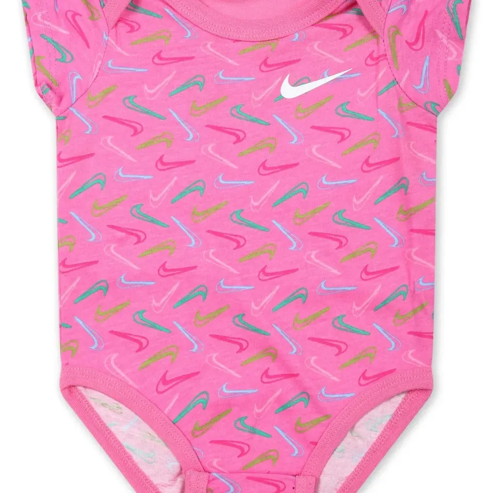 Комплект из топа и брюк с логотипом Swoosh