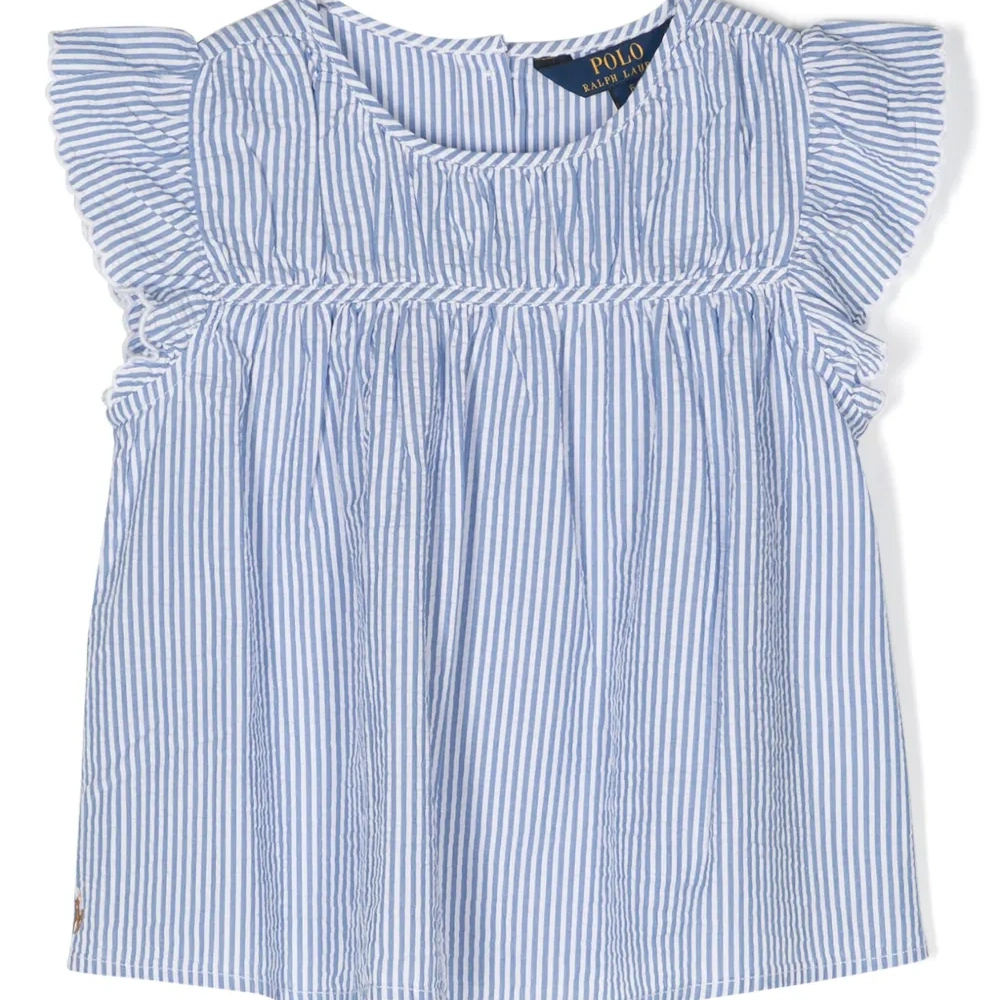 Полосатая блузка с оборками