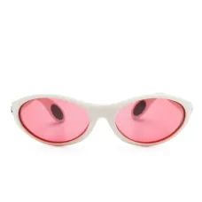 Солнцезащитные очки в овальной оправе Солнцезащитные очки в овальной оправе