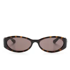 Солнцезащитные очки в овальной оправе Солнцезащитные очки в овальной оправе