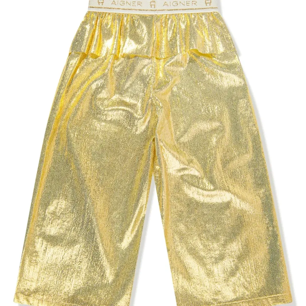 Брюки с баской и эффектом металлик