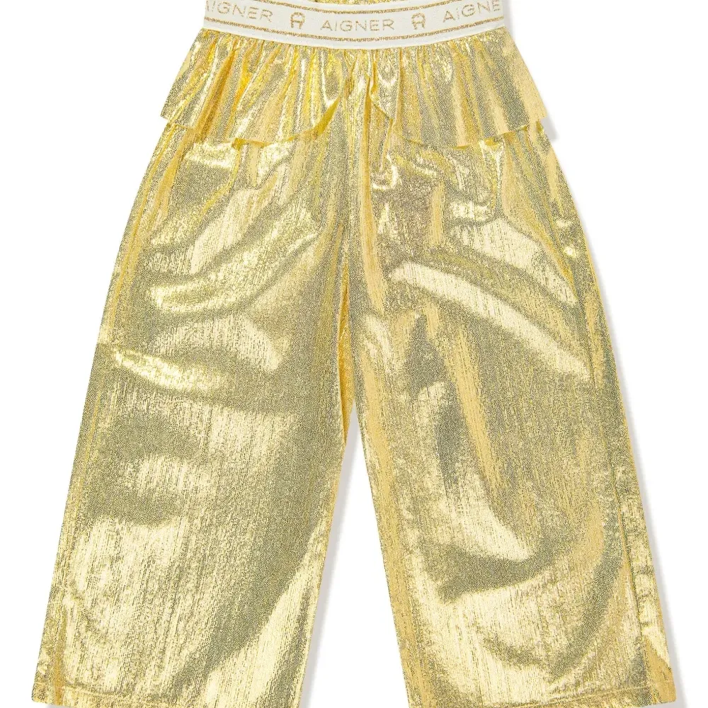 Брюки с баской и эффектом металлик