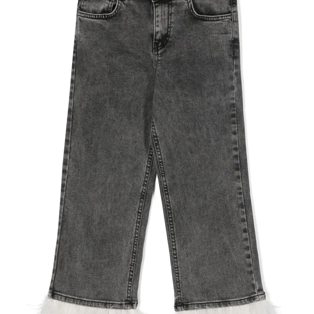 Джинсы из органического хлопка с перьями