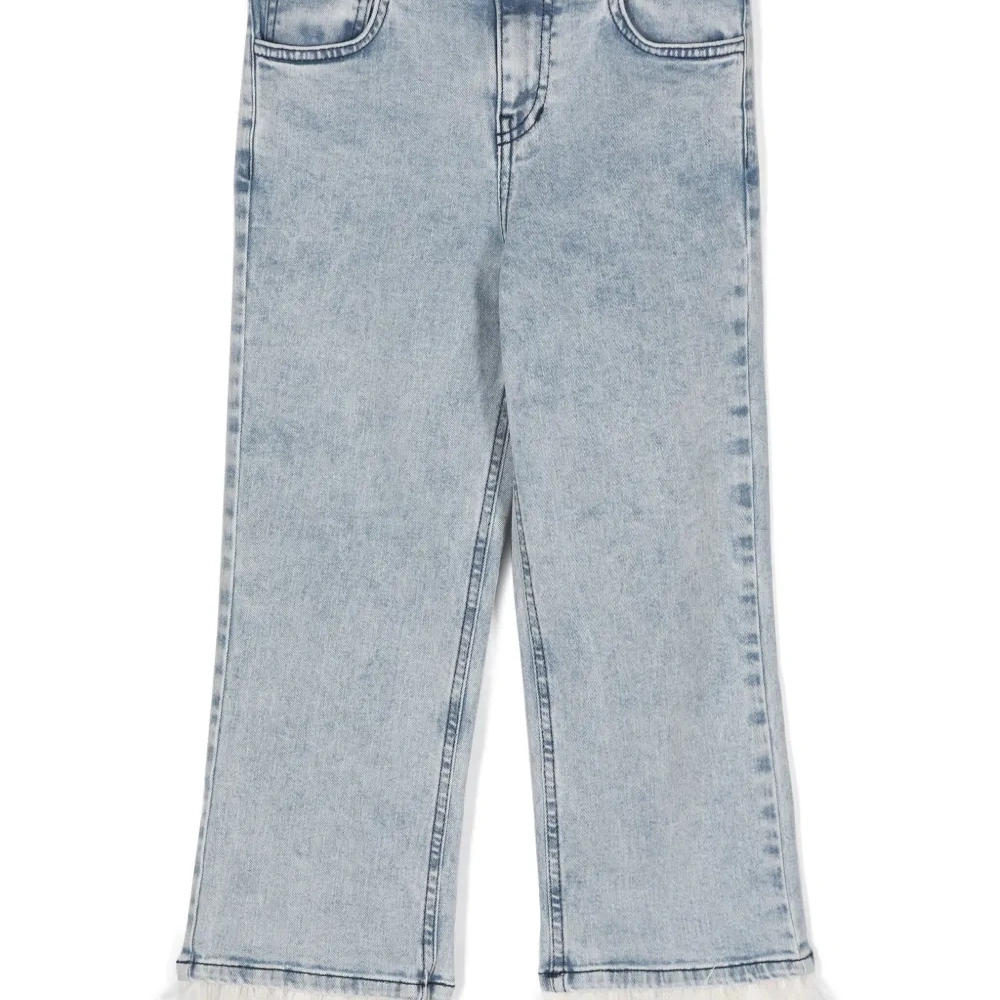 Джинсы из органического хлопка с перьями