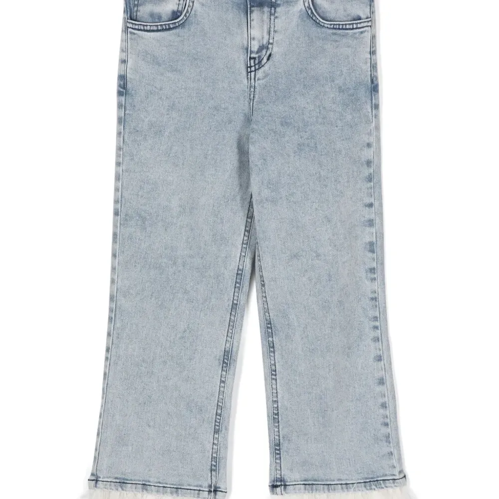 Джинсы из органического хлопка с перьями