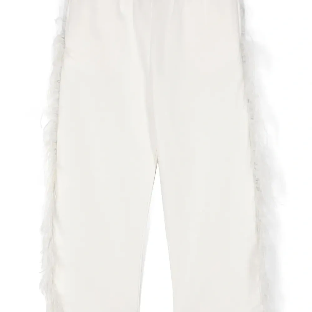 Брюки из органического хлопка с перьями