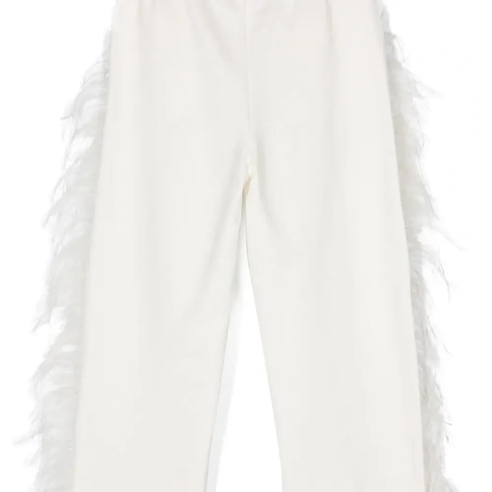 Брюки из органического хлопка с перьями