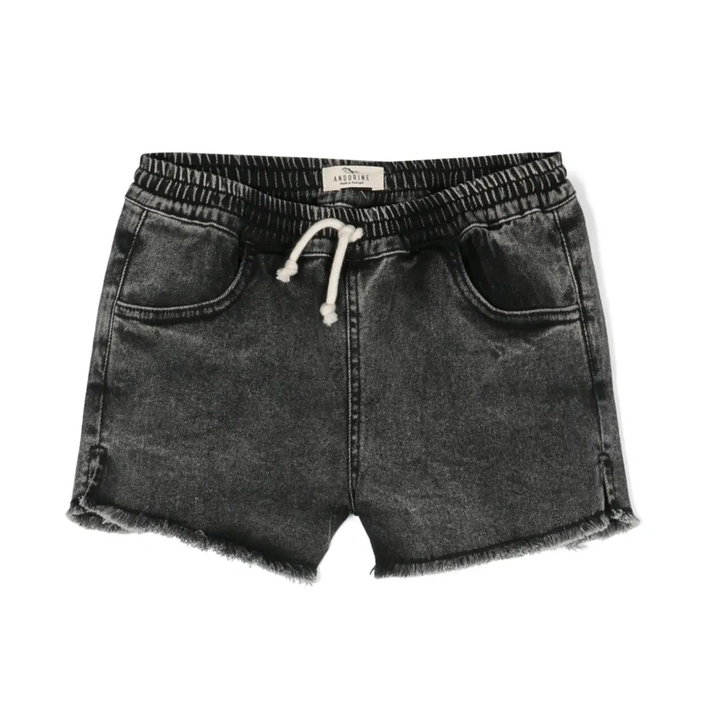 Джинсовые шорты с бахромой