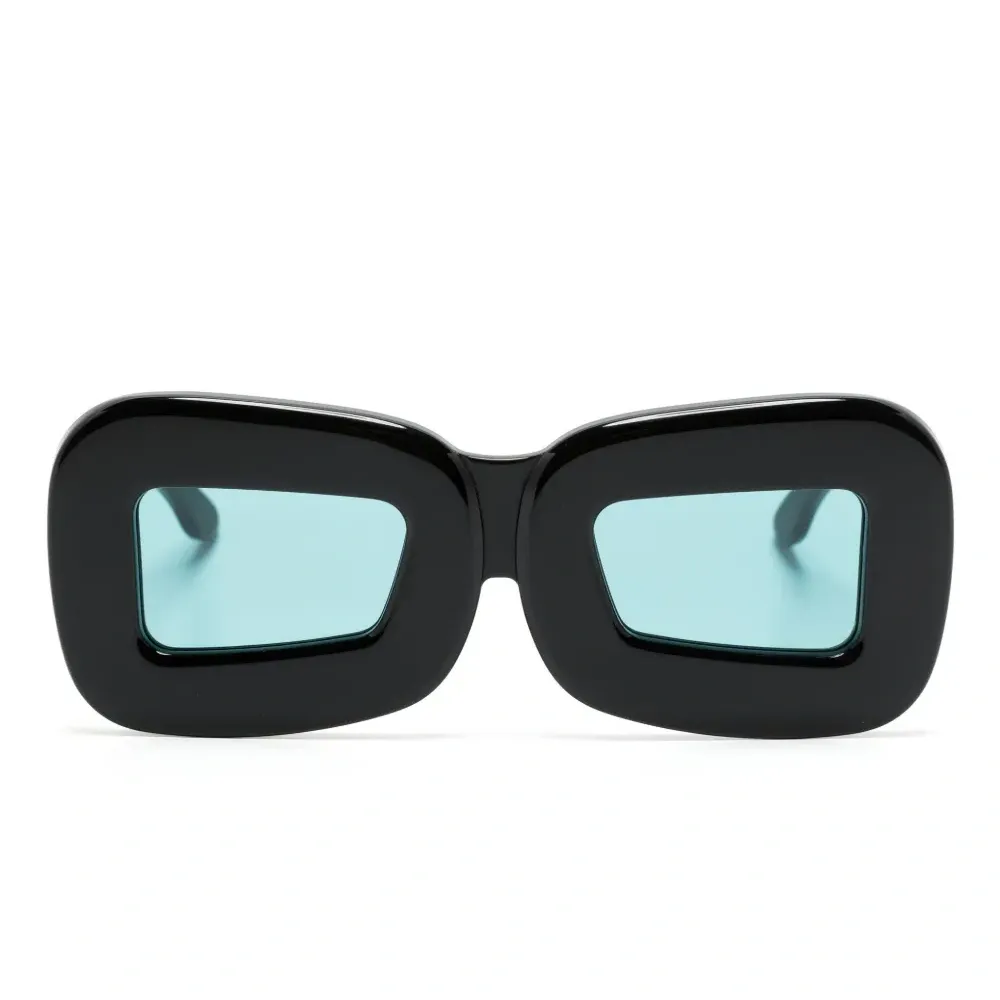 Солнцезащитные очки в массивной оправе Солнцезащитные очки в массивной оправе