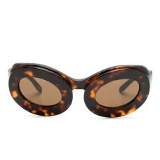Солнцезащитные очки в оправе черепаховой расцветки Солнцезащитные очки в оправе черепаховой расцветки