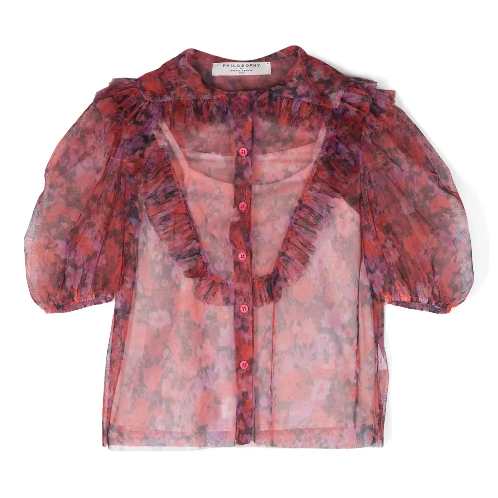 Полупрозрачная блузка с оборками