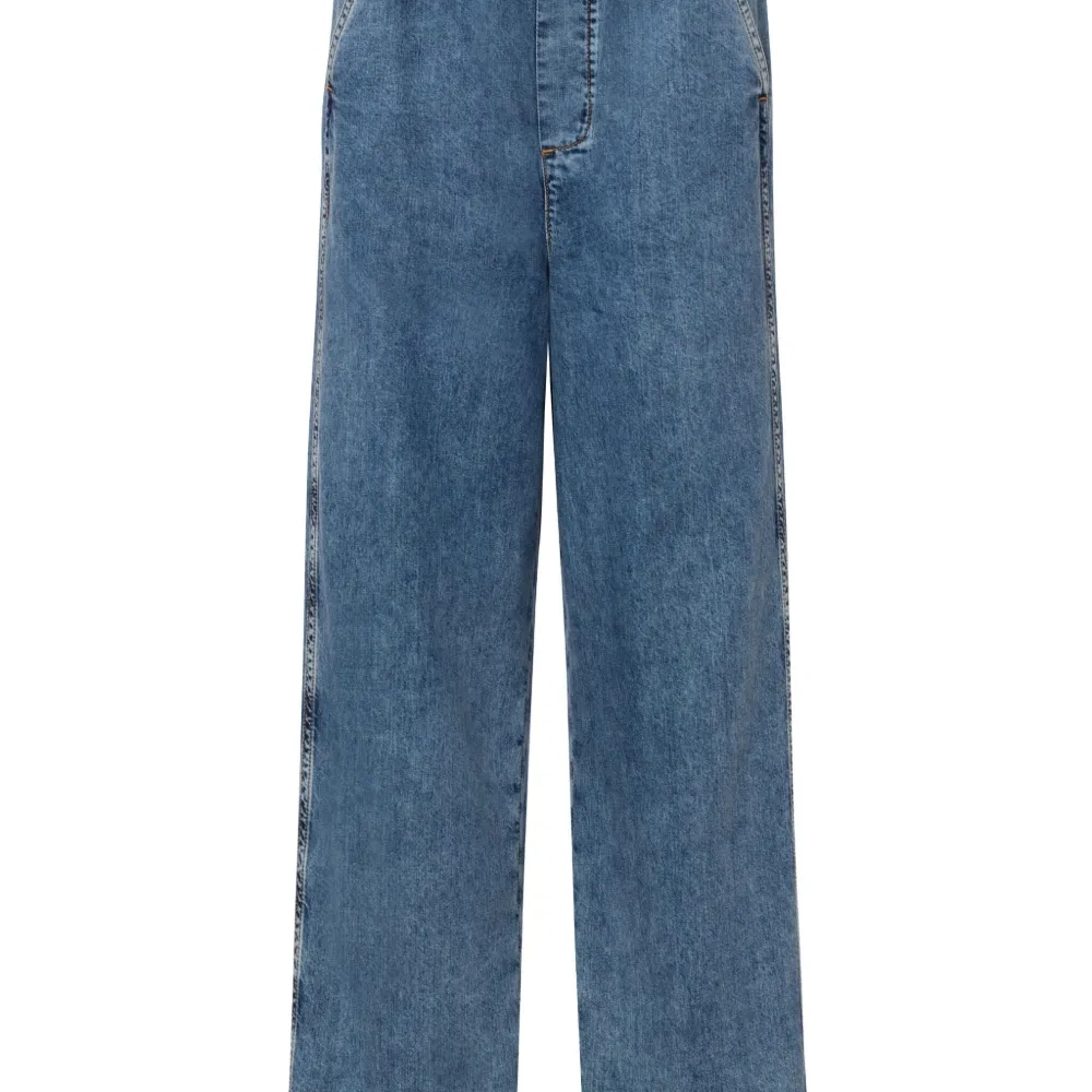 Джинсы широкого кроя с завышенной талией