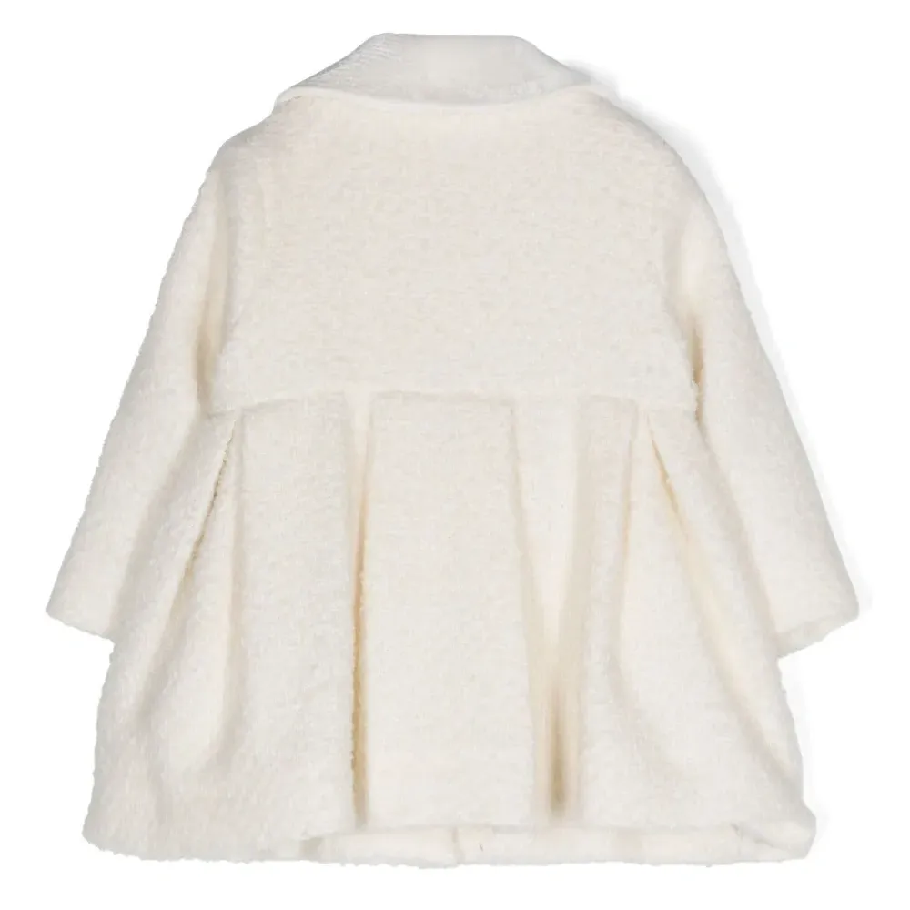 Расклешенное пальто Расклешенное пальто