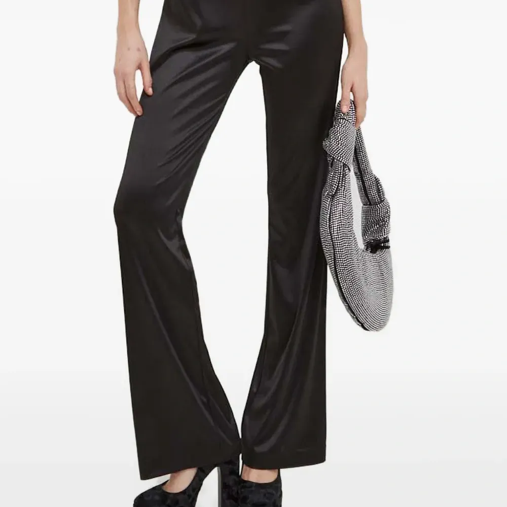 Брюки с пряжкой